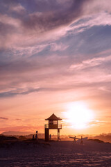 Gold Coast Currumbin beach sunset and surfer silhouettes
