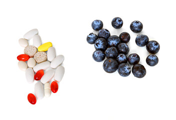 Choice: medical pills or vitamins in berries?