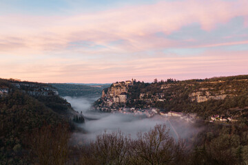Rocamadour sunrise, Aerial view of the french village and castle on cliff in early morning with...