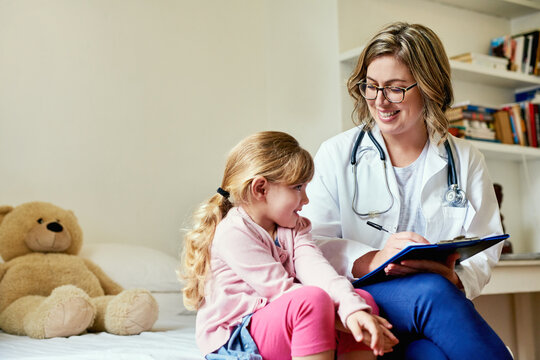 Making The Biggest Difference To The Littlest People. Shot Of A Doctor Having A Consultation With A Little Girl In Her Consulting Room.