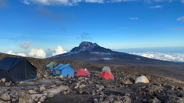 Mount Mawenzi. Mountain landscape. Several tents stand at the Baranco camp. Climbing Kilimanjaro, Africa.