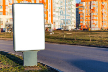 White screen billboard mockup by the road