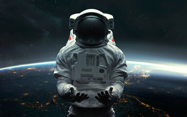 Astronaut at the Earth orbit. 5K realistic science fiction art. Elements of image provided by Nasa - obrazy, fototapety, plakaty