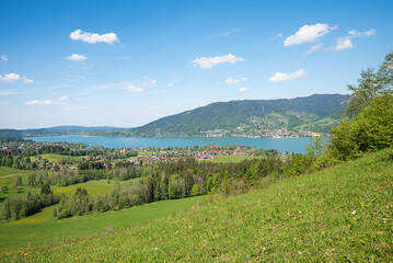idyllic spring landscape Kleinbuch, view to lake Tegernsee and Bad Wiessee tourist resort, upper bavaria