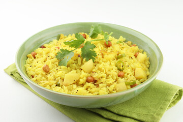 indian breakfast dish poha Aloo/Kanda Poha or Tarri Pohe with spicy chana masala/curry
