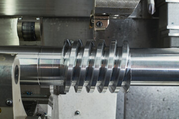 turning grooving operation on cnc machine. metal cut industry. Precision machining process