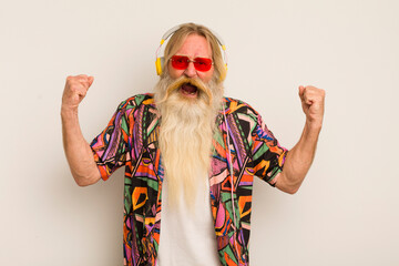 cool senior man shouting aggressively with an angry expression