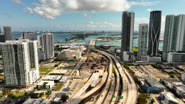 Aerial push in approach Signature Bridge under construction Miami Florida USA