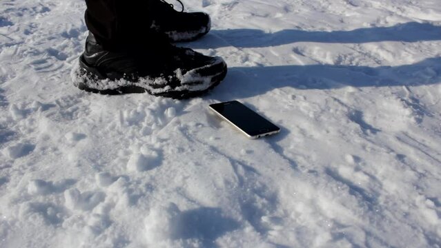 The Finding a lost phone. Find your lost phone. Raise smartphone. Someone else's smartphone on the street.