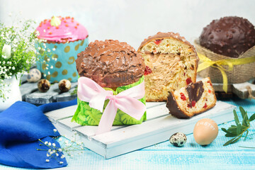 Easter cakes. Painted eggs. Easter background. Spring still life. Panettone with chocolate. 