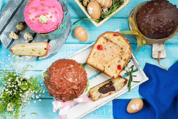 Easter cakes. Painted eggs. Easter background. Spring still life. Panettone with chocolate. 