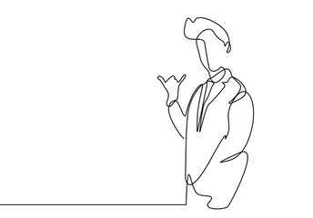 a businessman is making a phone call sign with his fingers