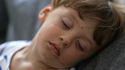 Little boy asleep child napping close-up face toddler boy resting