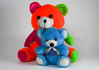 two bear cubs.a soft toy on a white background.