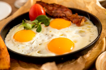 breakfast table with a variety of dishes and drinks