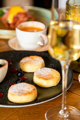 breakfast table with a variety of dishes and drinks