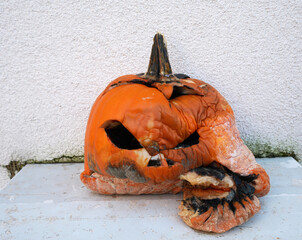 Rotten halloween pumpkin after the holidays