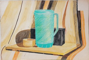 a green water jug with golden bowl on table