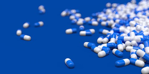 blue and white pharmaceuticals capsules 3D computer generated isolated on blue background