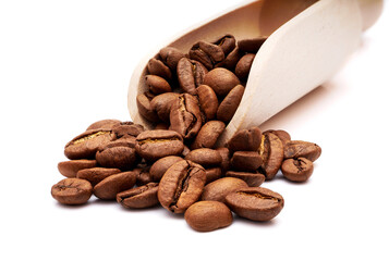 Roasted coffee beans in wooden scoop isolated on white background