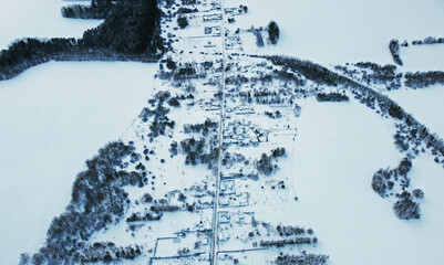 Aerial view from a height on the map of a suburban area with houses and roads