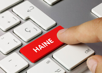 Haine - Inscription sur la touche du clavier rouge. - obrazy, fototapety, plakaty