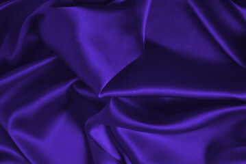 Purple silk or satin luxury fabric texture can use as abstract background.