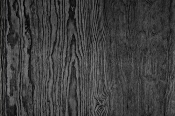 Black wooden pattern texture. Larch plywood. Dark wood background