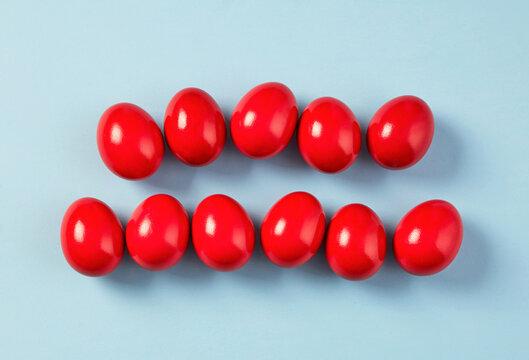 Red eggs on blue background