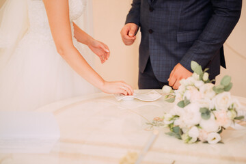 Obraz na płótnie Canvas Gentle photo of wedding rings dressing 3987.
