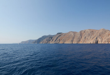 Fototapeta na wymiar Panorama of the rocky sea coast taken on a boat trip in the Mediterranean