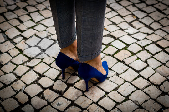 High heels on cobblestones