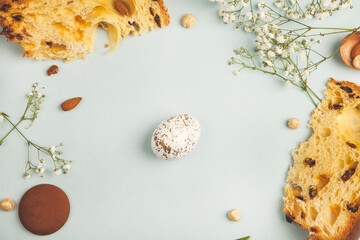 Hand painted pastel colored Easter eggs background. Happy Easter greeting card or invitation.