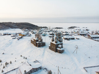 View of the wooden temples and the Pomor village Vorzogory. Russia, Arkhangelsk region 
