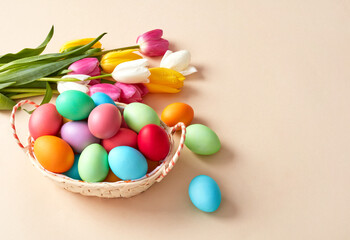Fototapeta na wymiar Colorful tulips and Easter eggs