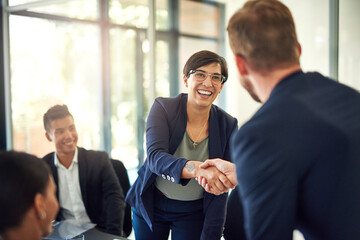 Its great to have you on baord. Shot of a group of businesspeople meeting in the boardroom.