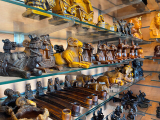 Figurines of sphinx with ram's head and Pharaohs in souvenir shop in Hurghada, as travel concept....