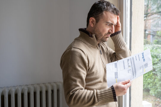 One Man Worried About Bills Reading Energy Increase Costs