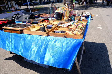 flea market flip in the city, antiques, old furniture, tables, used things, clothes and other goods...