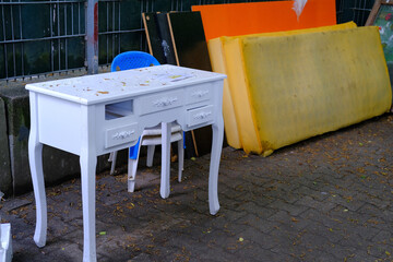 bulky waste, old furniture, tables, used things on the street before it is collected, problem of...