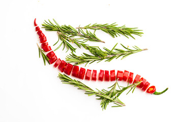 Hot chili peppers and rosemary isolated on a white background
