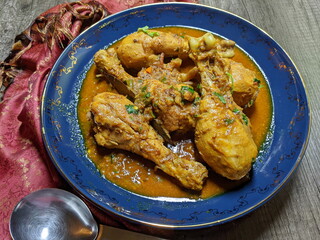 A bowl of Chicken Drumsticks curry
