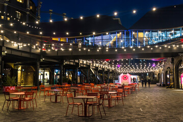 Coal Drops Yard at night, Handyside area, King's Cross urban regeneration, London, England, UK