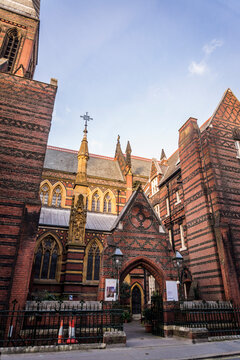 All Saints Church, a Grade I listed Anglo-Catholic church designed by William Butterfield in High Victorian Gothic style and built in 1850s, London, UK