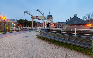 The old city gate Morspoort in Leiden at sunrise.