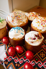 Easter sweet bread Orthodox kulich, paska and painted eggs. Prepearing for traditional Easter in Ukraine.