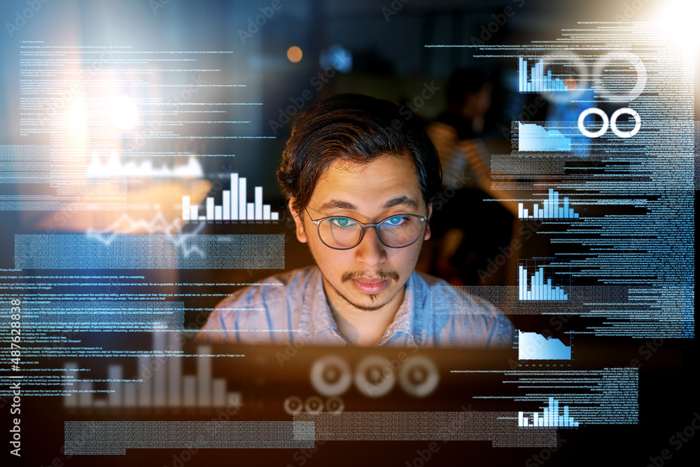 Poster Focused on the task. Shot of a computer programmer looking through data in the office.