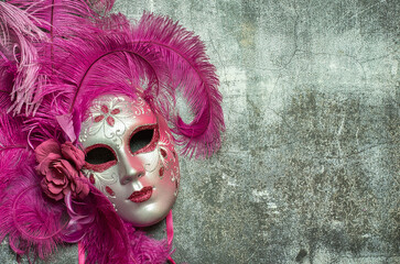 Carnival mask handmade in venice. The mask is made of papier-mâché and represents the face of a...