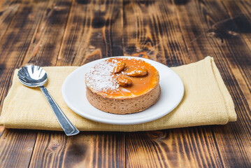 Round cake with condensed milk and almonds.