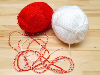 White and red threads in tangles. The symbol of the beginning of spring in the Balkan countries,...